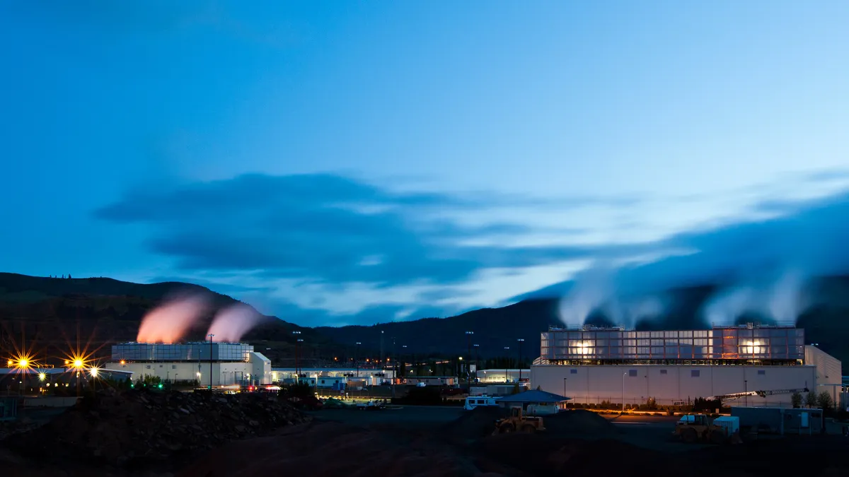 Plumes of steam rise above Google&#x27;s cooling towers at its data center at The Dalles, Oregon.